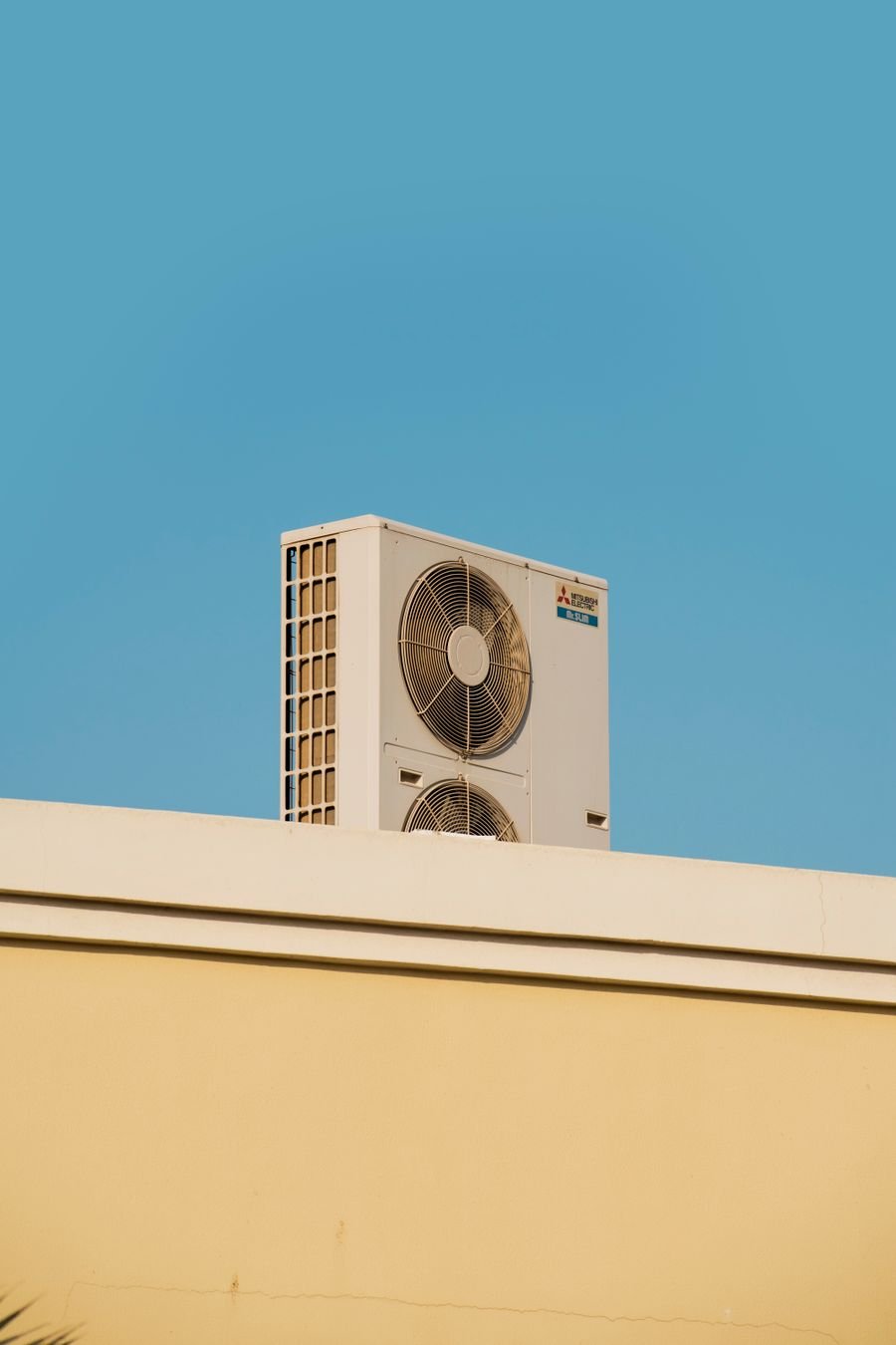 Outdoor air conditioner compressor and condenser coil