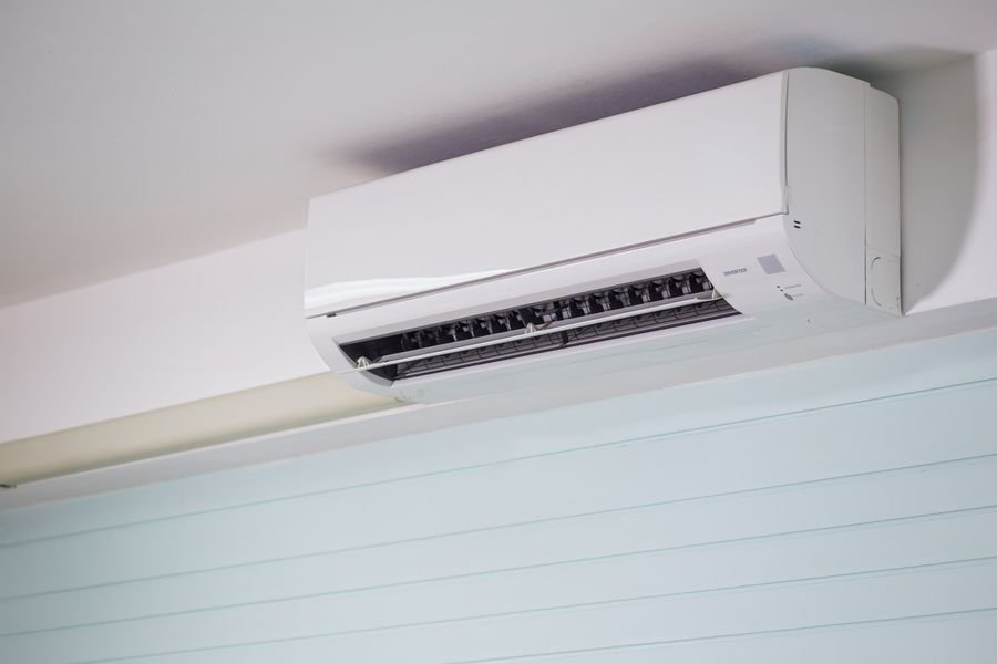 Split system aircon with the cover open for cleaning